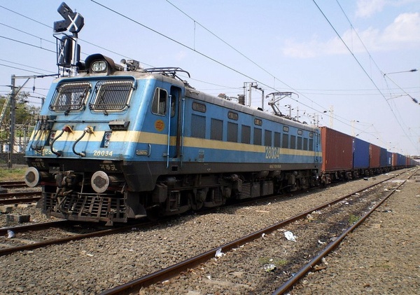 Surprise visitor to BSR. NKJ WAG-7 # 28034 in WAP-4 shell with container load at BSR