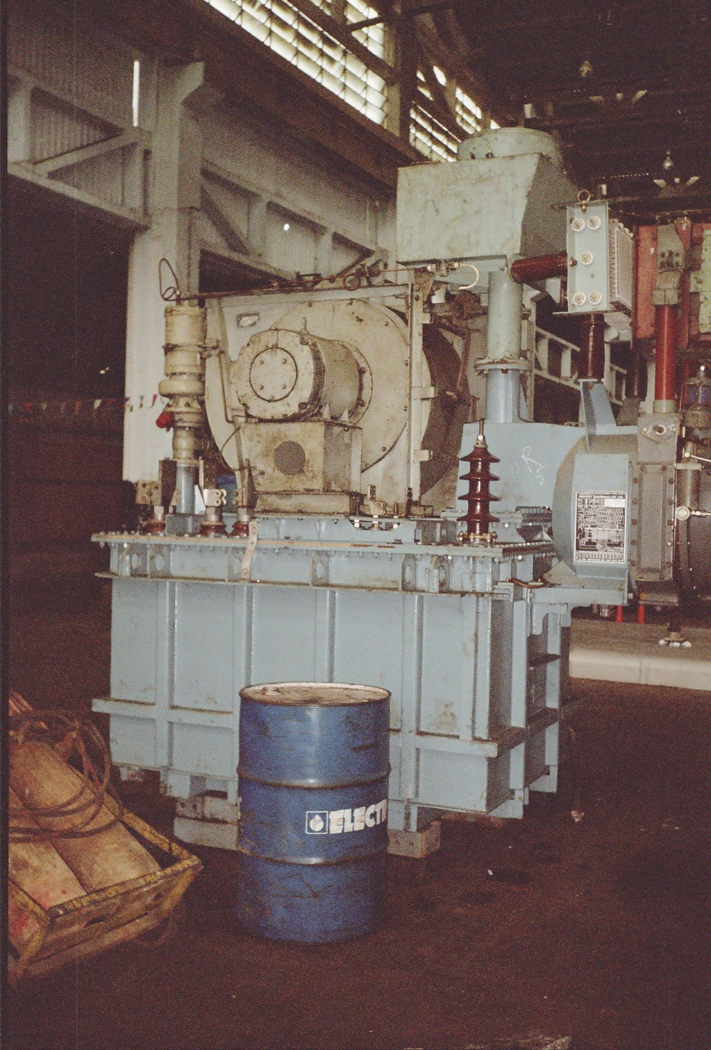 The transformer and its cooling equipment. The small vertical motor on top left is the MPH and the horizontal larger motor in the top centre is the MVRH and behind it is the oil cooling radiator.