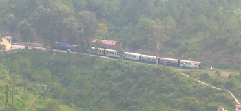 The himalayan queen in the distance....taken somewhere on the shimla-kalka road...By Vicky