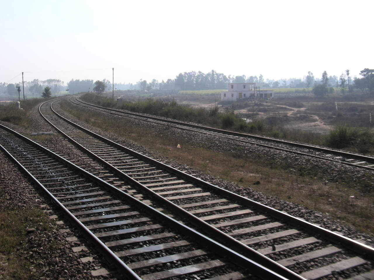 A tribute to Ruskin Bond.  Line branching off from Tapri Jn. towards 'Shamli'.  Always wanted to take this shot. 