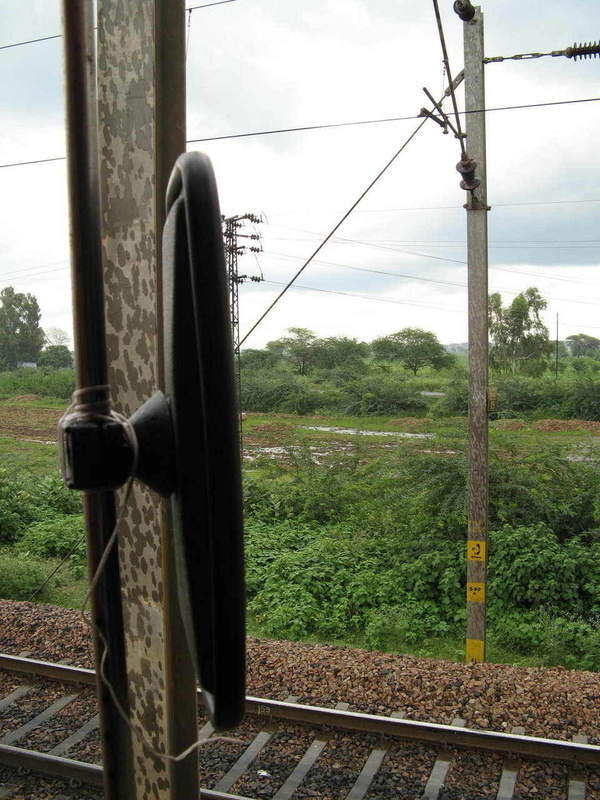 Rear View Mirror tied with a string.