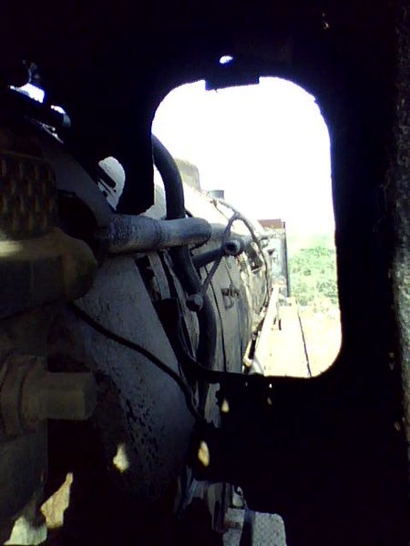 I take this photo from loco pilot's position of inspect through front window in cab of YP-2211. Loco pilot can see forward from 