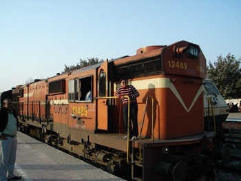 This microprocessor controlled DG-3A #13489(ABR) seen pulling gorakhdham Exp. at Hisar.This cute looking boy on the loco is my s