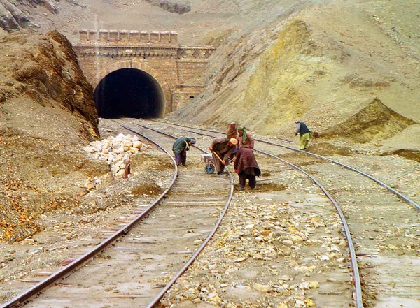 Railway Gangmen Repairing the tracks after a landslide near a tunnel entrance on chaman section