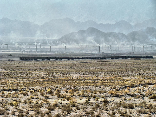 Baluchistan express near Quetta with a backcrop of brick kilns