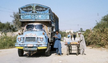 A lorry and a fruit stand