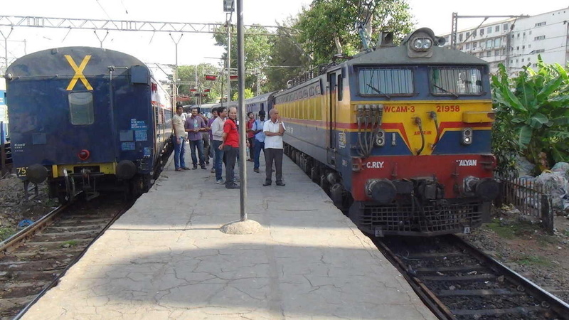 Everyone anxiously waits for decorated KYN WCAM-3# 21942 coupling at Mumbai Cst. KYN WCAM-3# 21958 waits for a starter with Nand