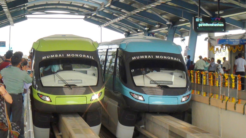 Two Mono Rail rakes in lovely butterfly like colours standing besides each other at Chembur.
 (Arzan Kotval)