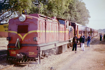 Warasedni station guard Mr Dubey and adopted son