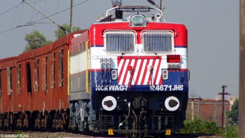 Jhansi WAG 7 # 24671 (Tiger Face) Running at full Speed by hauling BCNA rakes Towards Jhansi from Bhopal Jn Near Patra River Bri