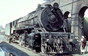 WG #10106 is stabled in the old broad gauge shed at Patna Junction, providing a convenient supply of hot water for the locals! T