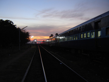 The Guruvayur Express halts for a crossing with the Nellai Express at Naraikkinar