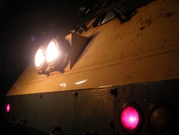 Antithesis? A mighty WDP4 has her headlights and tail lamps alight. Nice closeup and an unusual perspective.