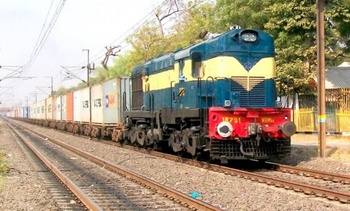 An attractive looking VTA WDM-3A# 18791 enters Maninagar station with a concor load. (Vrundan Shah)