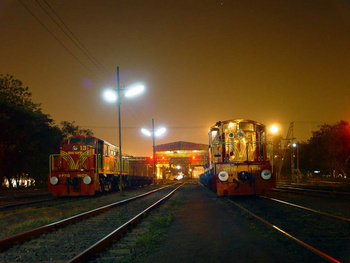 Gorgeous night time view of freight trains at the wagon tipping facility on the Kirandul Kottavalasa line. (2005). Engines in ch